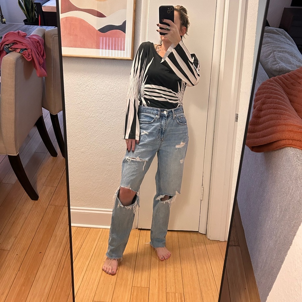 Black and White Patterned Top with Ripped Jeans